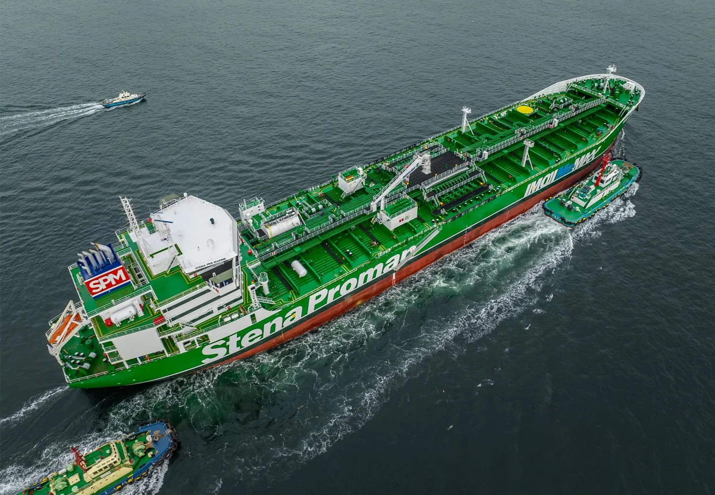 A green Stena Proman ferry in the water